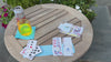 Wind blows a soda can across the table, but cards remain secure with our Chick Magnets spinner and clickboard set.